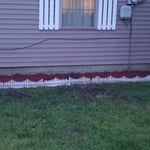 Front house bed with fence and custom brick
