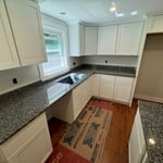 This kitchen remodel showcases the exquisite Azul Platino granite, featuring stunning blue, gray, and silver tones. Its natural elegance enhances both light and dark cabinetry, offering a modern, sophisticated look. Known for its durability and easy maintenance, Azul Platino is the perfect choice for a high-traffic kitchen. The expertly installed countertops bring both beauty and functionality, transforming the kitchen into a stylish, long-lasting space.