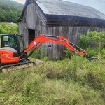 Excavator bush hogging