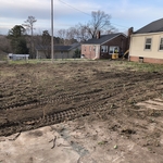 After removing trash, vines, branches, and chain link fence