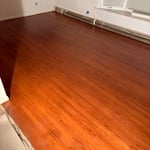 Hardwood floor refinishing. Old Carpet removed and new life brough to the room.