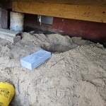 putting new footers under a camp