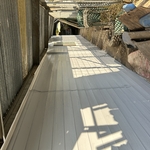 Left side of home.
