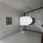 Tankless wall mounted toilet.