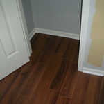 Instalation of wood floors, trim, and doors.
