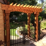 Cedar arbor with Jerith gate.