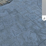 Stamp concrete around the pool.
