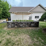 Wall wrapped in stone