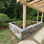 Wall wrapped in stone