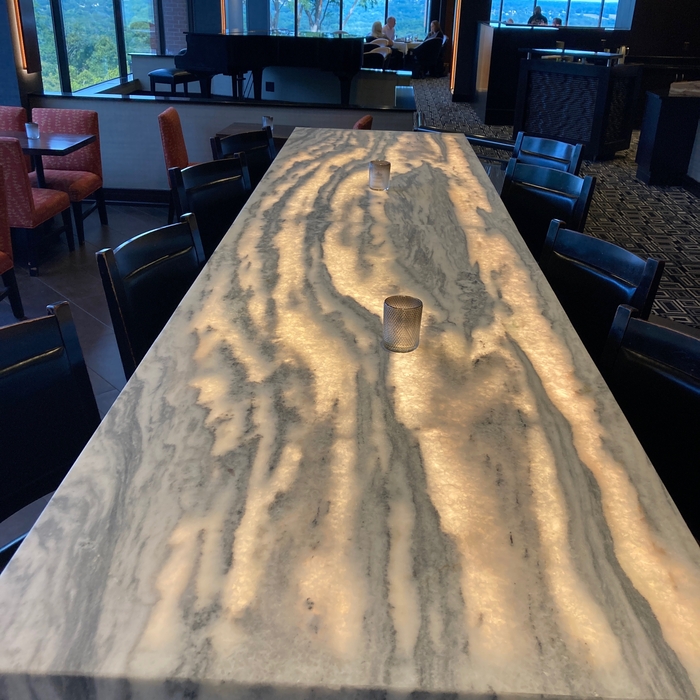 Beautiful Leathered, Mitered Marble Table - Light up your world at Aurora Stone