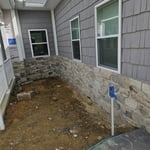 Between apt. & porch