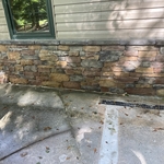 Stone on front of house