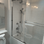 Bathroom remodel. Installation of new bath tub, shower valve and new finish items. Complete rough in to finish.