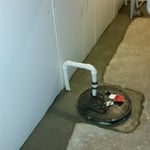 Interior basement waterproofing system