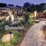 Small sandstone patterned colored and textured sidewalk with LV pathlighting