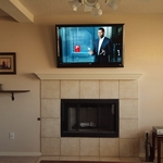 Above fireplace