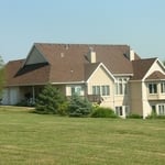 After view of the back of the home.