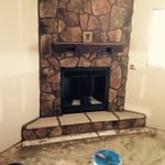 A sand stone fire place in an addition we built