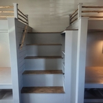 Cedar custom built bunk.beds with stairs.