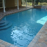 Pool Interior Mini Pebble Resurface, 6' Underwater Bench Addition, New Skimmer, New Waterline Tile, Brick Coping, Paver Deck, 3 New LED Pool Lights, Re-Plumb Existing Lines & Add 3 Raised Planters With 4' Sheer Descent..
