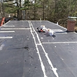 The existing seams and penetrations are then prepared by apply a special sealant to them.