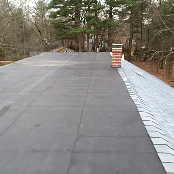 Roof was a 30-yr old rubber roof that was beginning to leak.