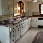 Cabinet refinishing.