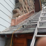 This homeowner has a bad leak so we replace slate and put in heavy copper flashing on this Fire Chimney on upper and lower lvl then seal wall off with solar seal!