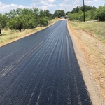 Hot application of liquid asphalt