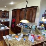 Before with raised bar top and old countertops granite