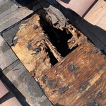 Tile roof valley repair in process. Rotted roof decking and failed underlayment exposed. Windermere, FL - Northmen Roofing