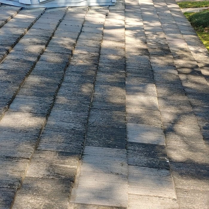 Job complete with original concrete tiles securely put back into place. While on the roof all cracked tiles that could be repaired were epoxied with appropriate material. - Northmen Roofing