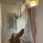 The painters are getting ready to paint here, but I wanted to point out that the old laminate is going to have to be taken up before the new Vinyl Plank can be installed.