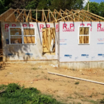 Just Wrapped the house for siding and set trusses for the roof.