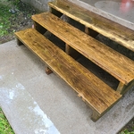 Concrete porch and wood steps