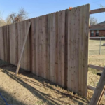 This is the side of the backyard area that the wooden fence in the process of being installed.