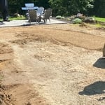 Regrade and pave