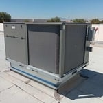 New sheetmetal curb and Ruud 7.5 Ton Package unit.