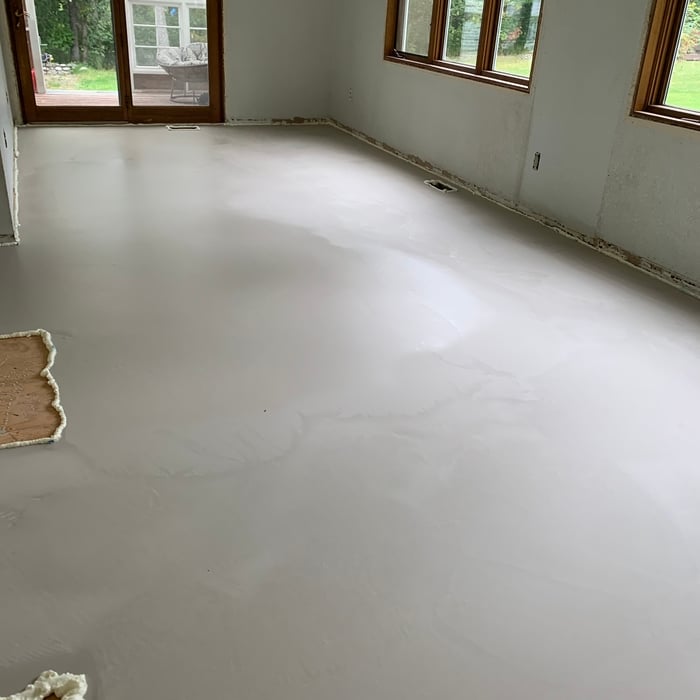 Laminate demoed and floor leveler poured