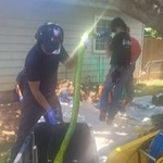 Trenchless sewer lining under home