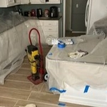 Protecting our customers property before jackhammering floor.