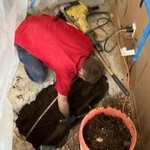 Concrete removal and dig down to sewer line