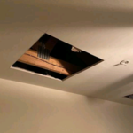 Opening of ceiling to begin drying