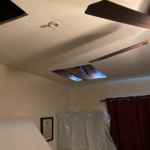 Opening of ceiling to begin drying
