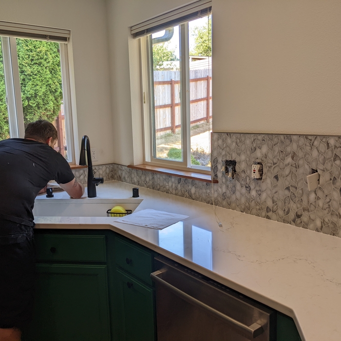 Quartz countertops & Marble Backsplash