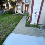 Removal of old grass and river rock installation