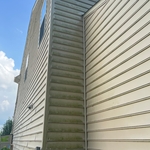 Wall of house, Portion of deck, Rust on garage door