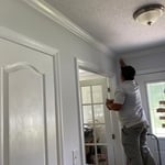 Painting living room and trim.