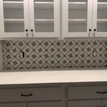 Designed tile backsplash install