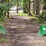 Graded driveway and installed gravel and dirt